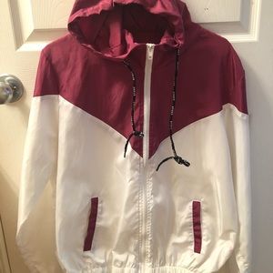 pink and white windbreaker